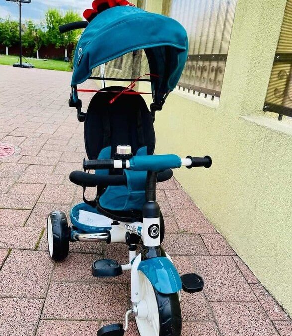 Tricicleta utilă pentru copii și părinți